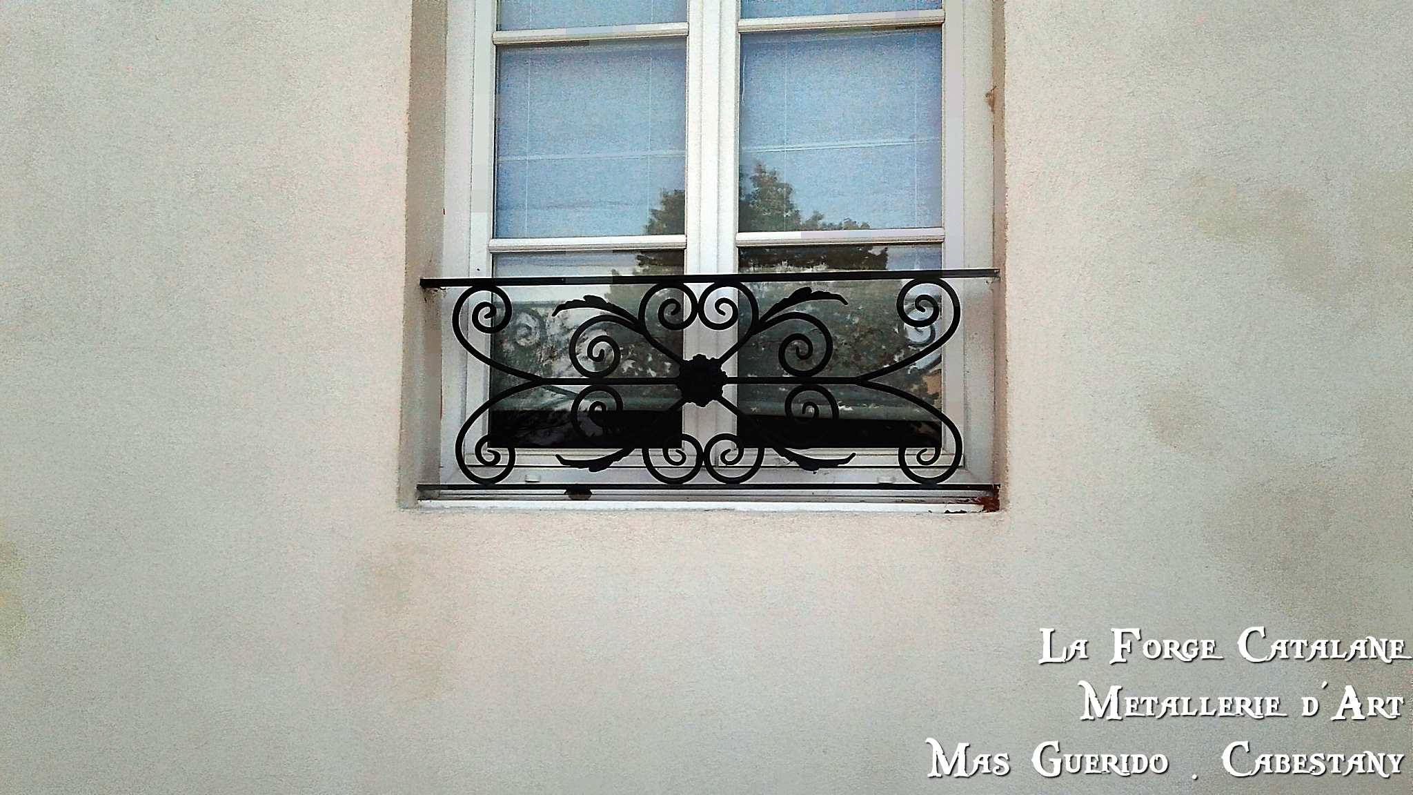 rehausse garde corps garde-corps decoupe laser volutes fer Forge Catalane Cabestany.jpg